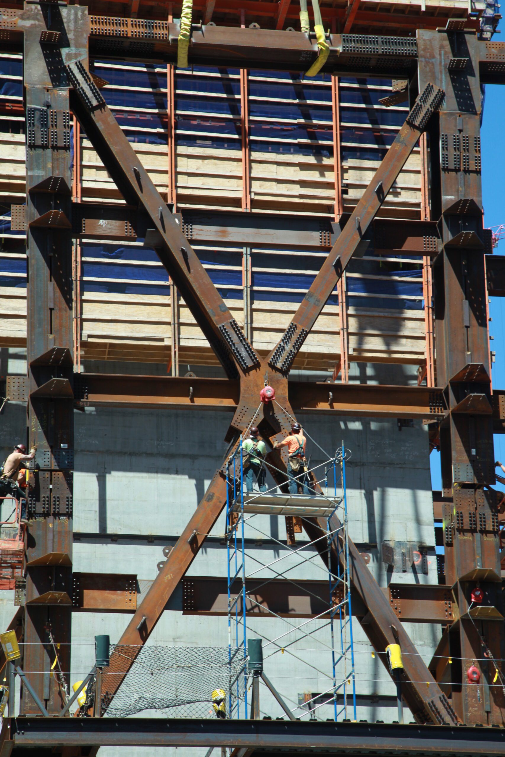Workers tend to a CSD-designed connection at the 150 N Riverside project
